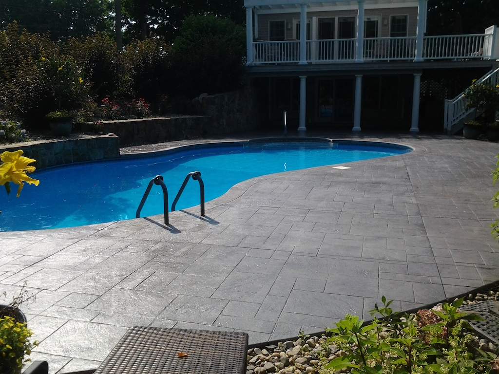 Swimming pool and stamped concrete project example 151